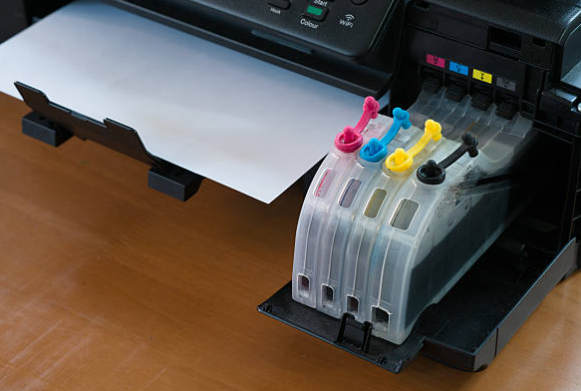 drukarka z tanimi tuszami